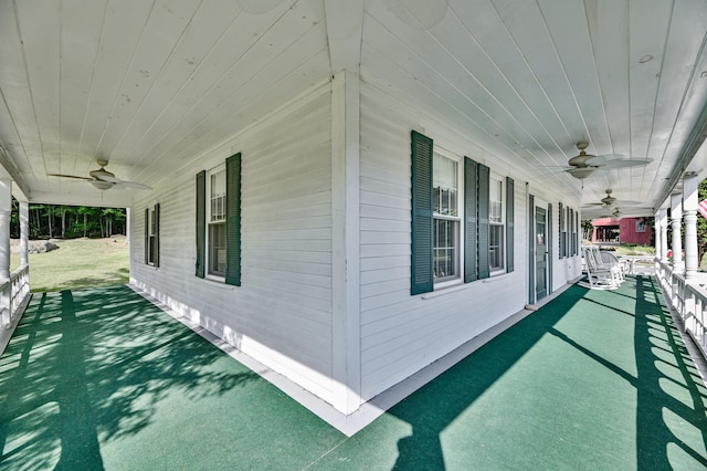 exterior space featuring a ceiling fan