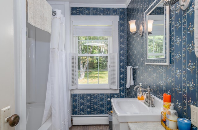 bathroom featuring a baseboard radiator, shower / bath combination with curtain, and wallpapered walls