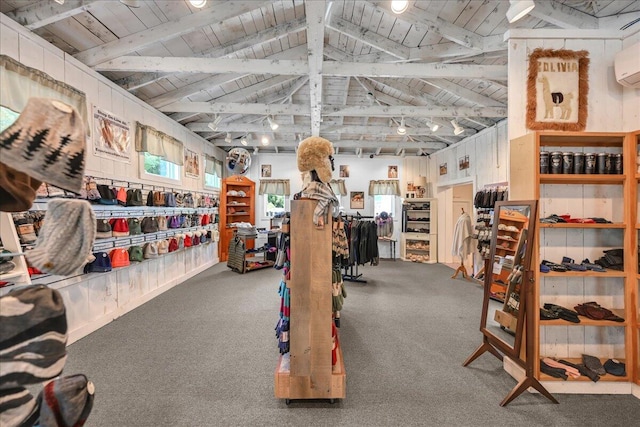 misc room with wooden ceiling, lofted ceiling with beams, and carpet flooring