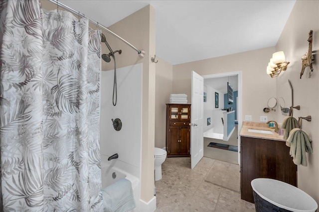 full bathroom featuring tile patterned floors, toilet, shower / tub combo with curtain, and vanity