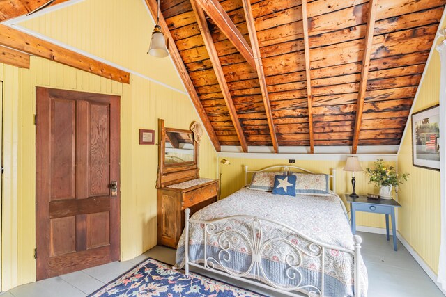 tiled bedroom featuring wood walls, wood ceiling, and lofted ceiling with beams