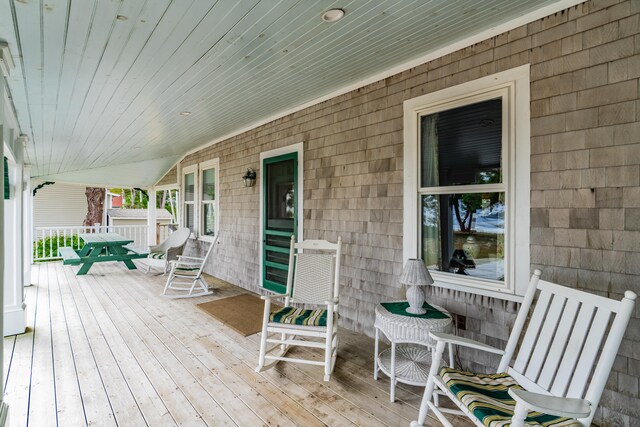 wooden deck featuring a porch