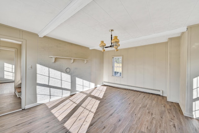 unfurnished dining area with beamed ceiling, a baseboard heating unit, light wood-style floors, baseboards, and a chandelier