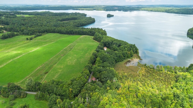 drone / aerial view featuring a water view and a rural view