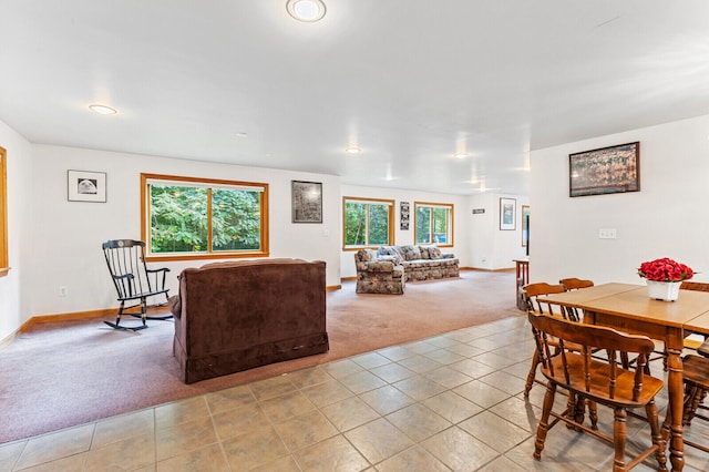 living room featuring light carpet