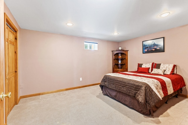 bedroom with a closet and carpet flooring