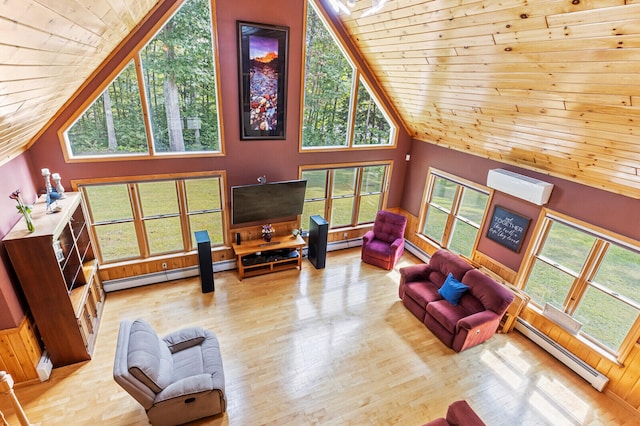 living room with high vaulted ceiling, wood ceiling, baseboard heating, and light hardwood / wood-style floors