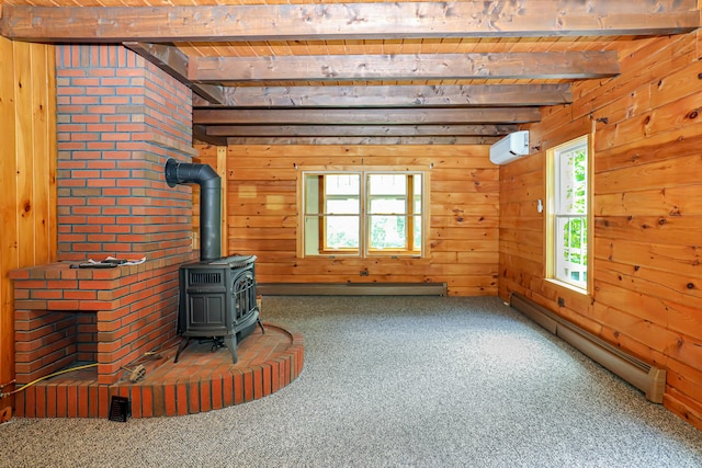 unfurnished living room with beam ceiling, wooden ceiling, a baseboard radiator, and a wood stove