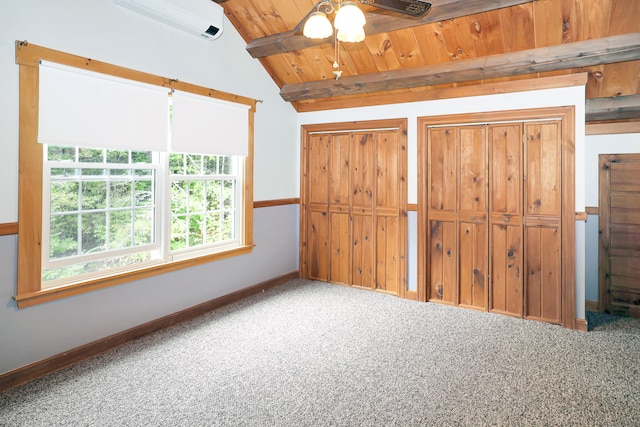 unfurnished bedroom featuring wood ceiling, carpet, lofted ceiling with beams, ceiling fan, and multiple closets