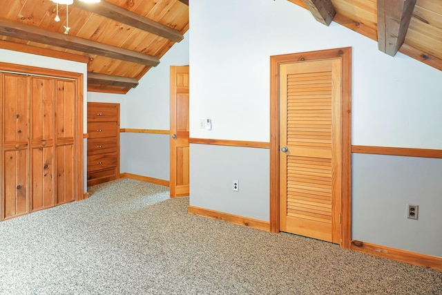 bonus room with carpet floors, ceiling fan, wood ceiling, and vaulted ceiling with beams