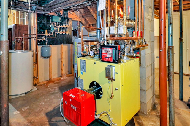 utility room with gas water heater