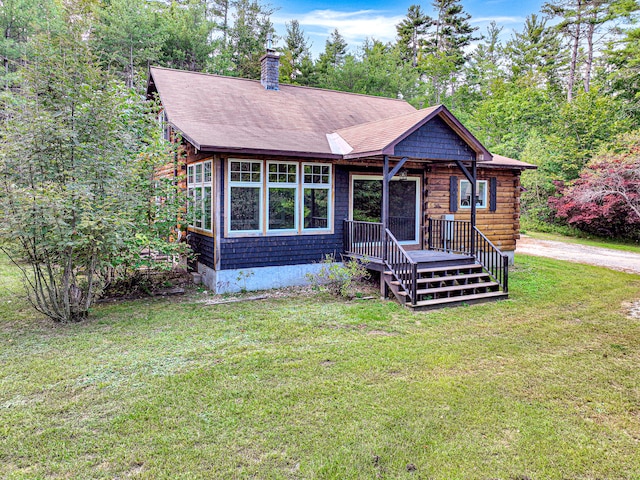 view of front of home with a front yard