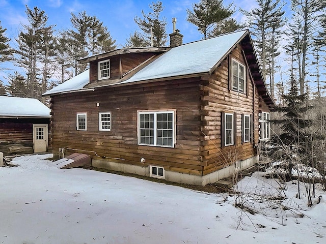 view of snow covered property