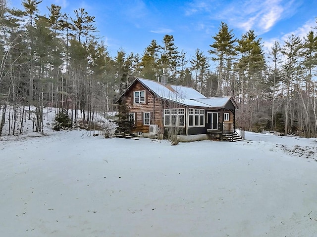 view of snow covered property