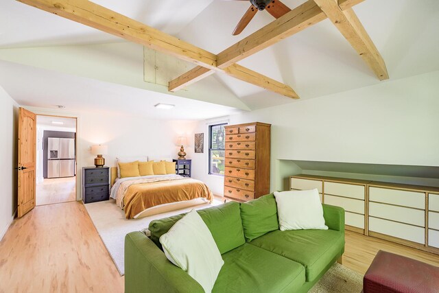 bedroom featuring ceiling fan, light hardwood / wood-style floors, beam ceiling, high vaulted ceiling, and stainless steel fridge with ice dispenser