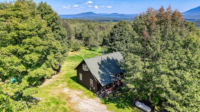 aerial view with a forest view and a mountain view