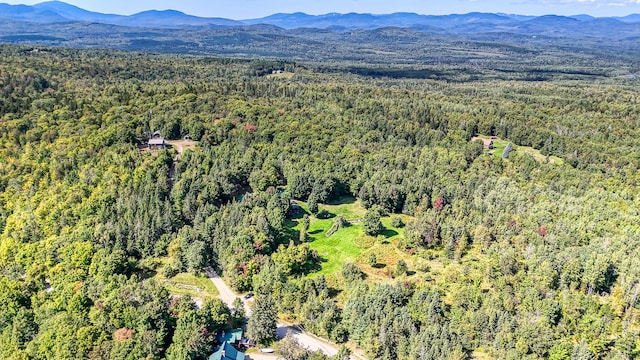 bird's eye view with a mountain view and a wooded view