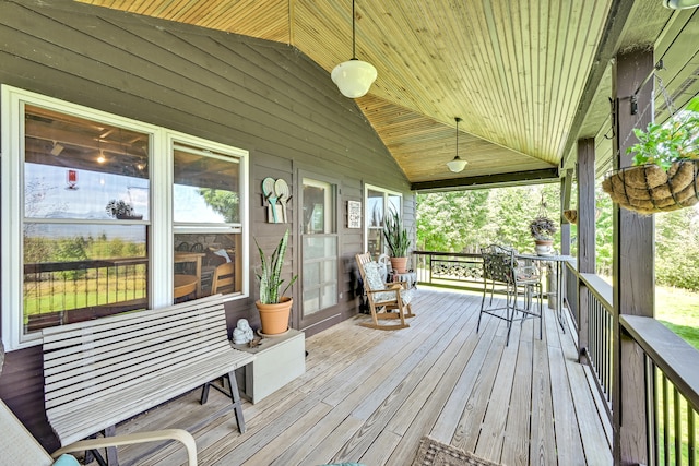 wooden terrace featuring a porch