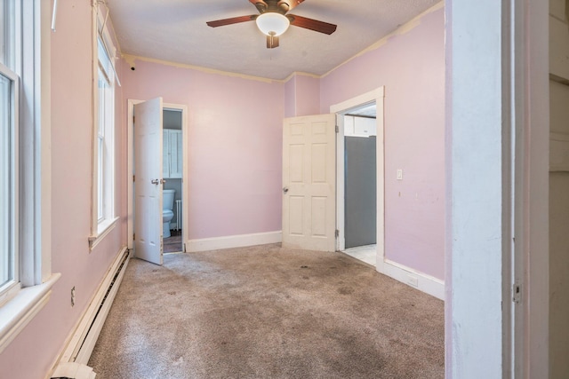 unfurnished bedroom with light carpet, ensuite bathroom, ornamental molding, and ceiling fan