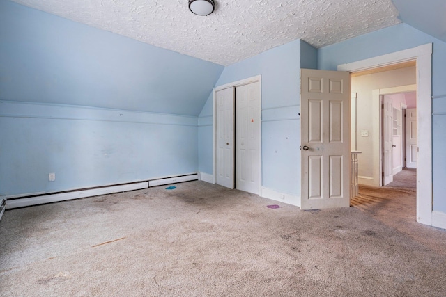 bonus room with carpet floors, a textured ceiling, lofted ceiling, and baseboard heating