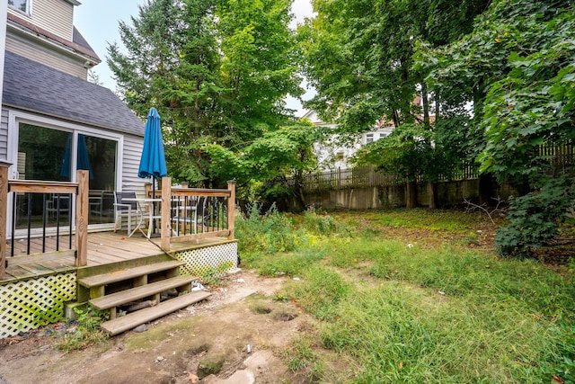 view of yard featuring a deck