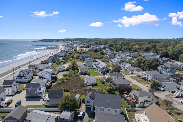 bird's eye view with a view of the beach and a water view