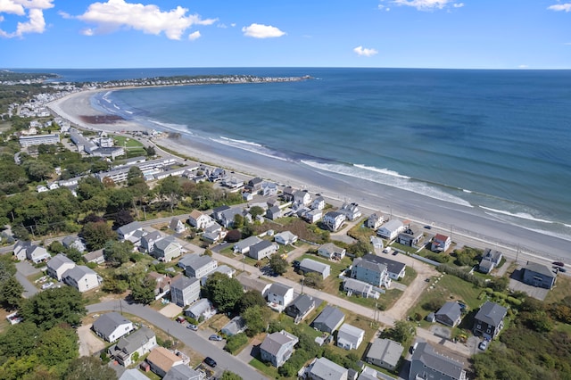 aerial view featuring a water view and a beach view