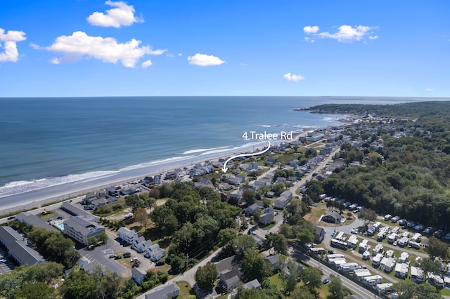 drone / aerial view featuring a view of the beach and a water view