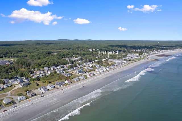 aerial view featuring a water view and a beach view