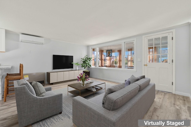 living room with light wood-type flooring and a wall mounted AC