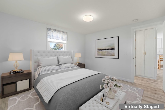 bedroom featuring light hardwood / wood-style flooring