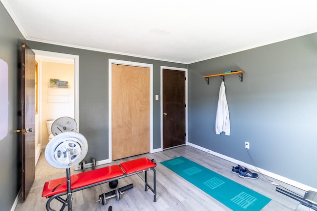 interior space featuring ornamental molding and hardwood / wood-style flooring