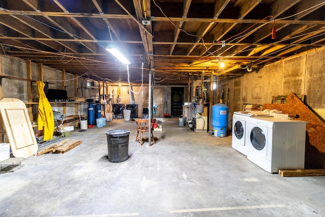 basement featuring washing machine and dryer