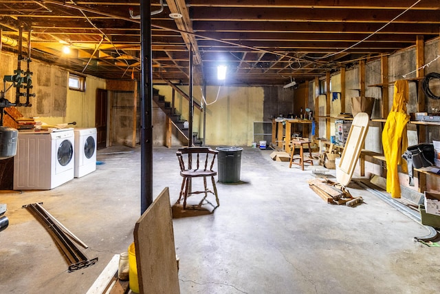 basement featuring washing machine and clothes dryer