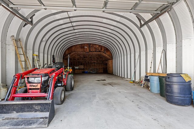 garage featuring a carport