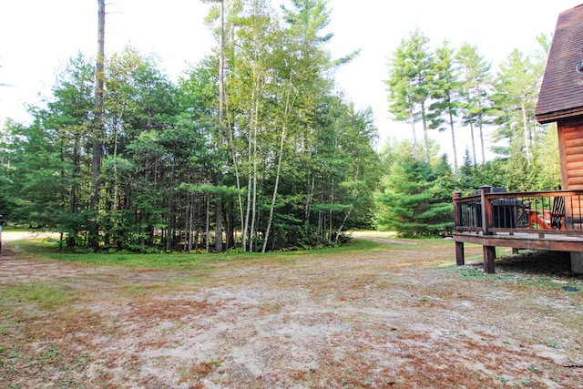 view of yard featuring a deck