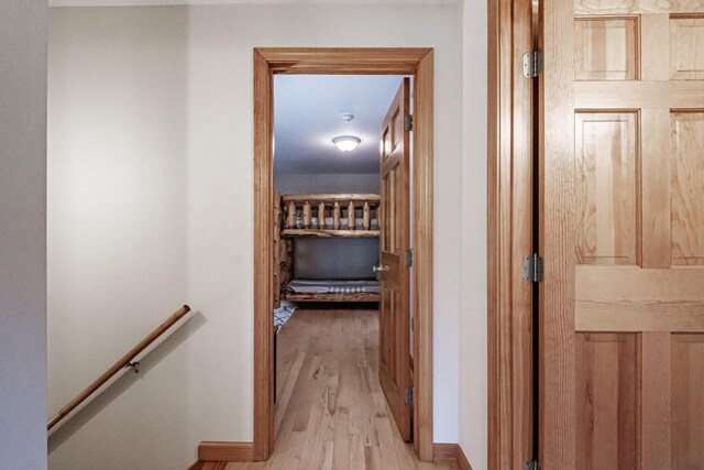 corridor featuring light hardwood / wood-style floors