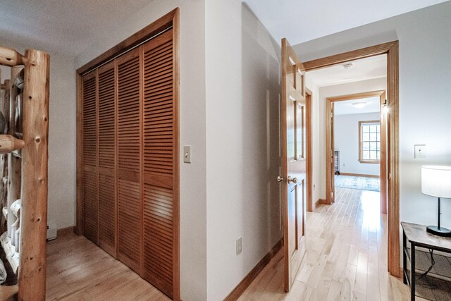 hall featuring light hardwood / wood-style flooring