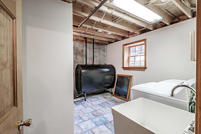 clothes washing area featuring washer / clothes dryer