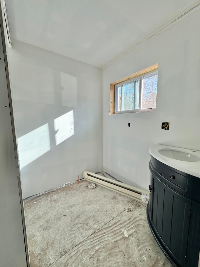 bathroom featuring vanity and a baseboard heating unit