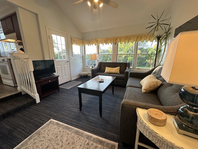 carpeted living room featuring lofted ceiling and ceiling fan