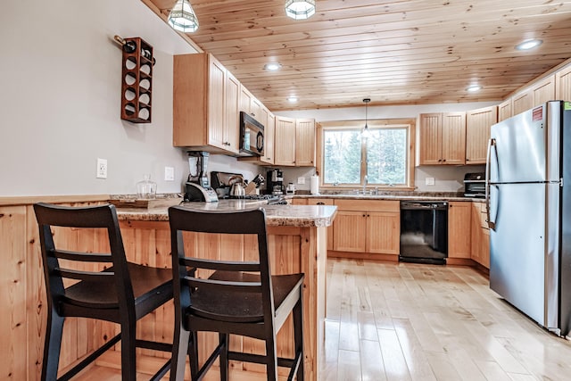kitchen with black appliances, light brown cabinets, and wood ceiling