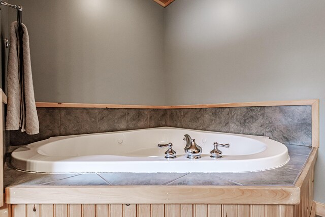 bathroom with a tub