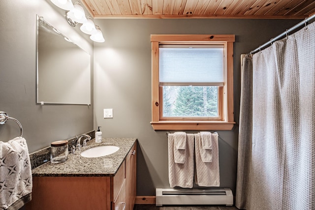 bathroom featuring vanity, baseboards, curtained shower, a baseboard radiator, and wooden ceiling
