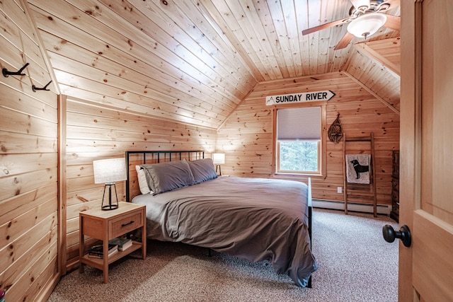carpeted bedroom featuring ceiling fan, wooden ceiling, a baseboard heating unit, lofted ceiling, and wooden walls