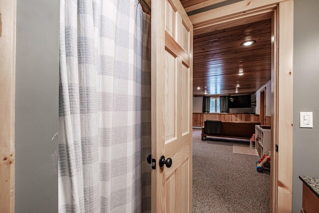 bathroom with vanity and wooden ceiling