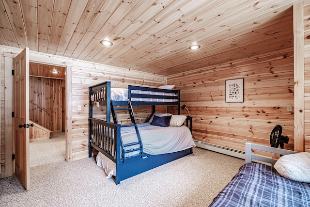 bedroom featuring baseboard heating, recessed lighting, wood walls, carpet, and wood ceiling