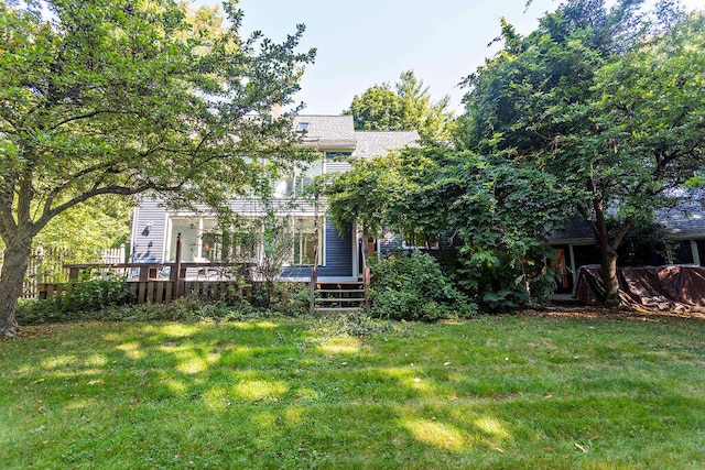 view of yard featuring a deck