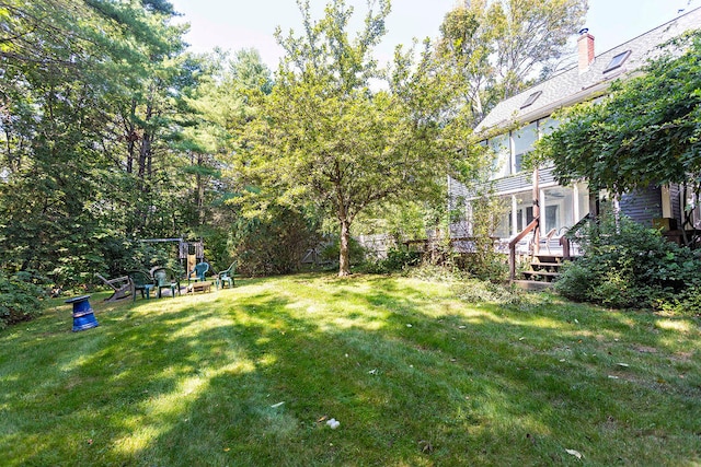 view of yard featuring a deck