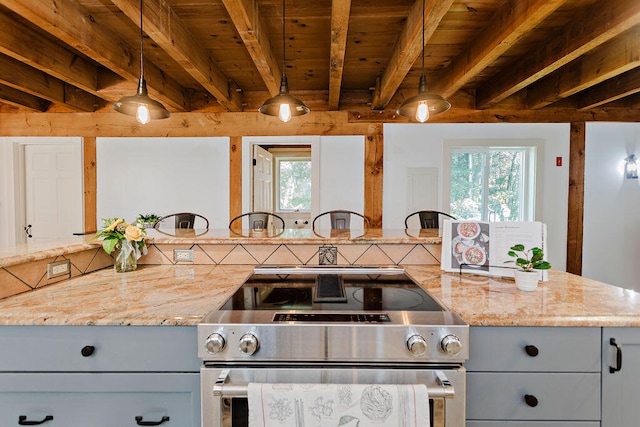 kitchen with pendant lighting, gray cabinets, and stainless steel electric range oven